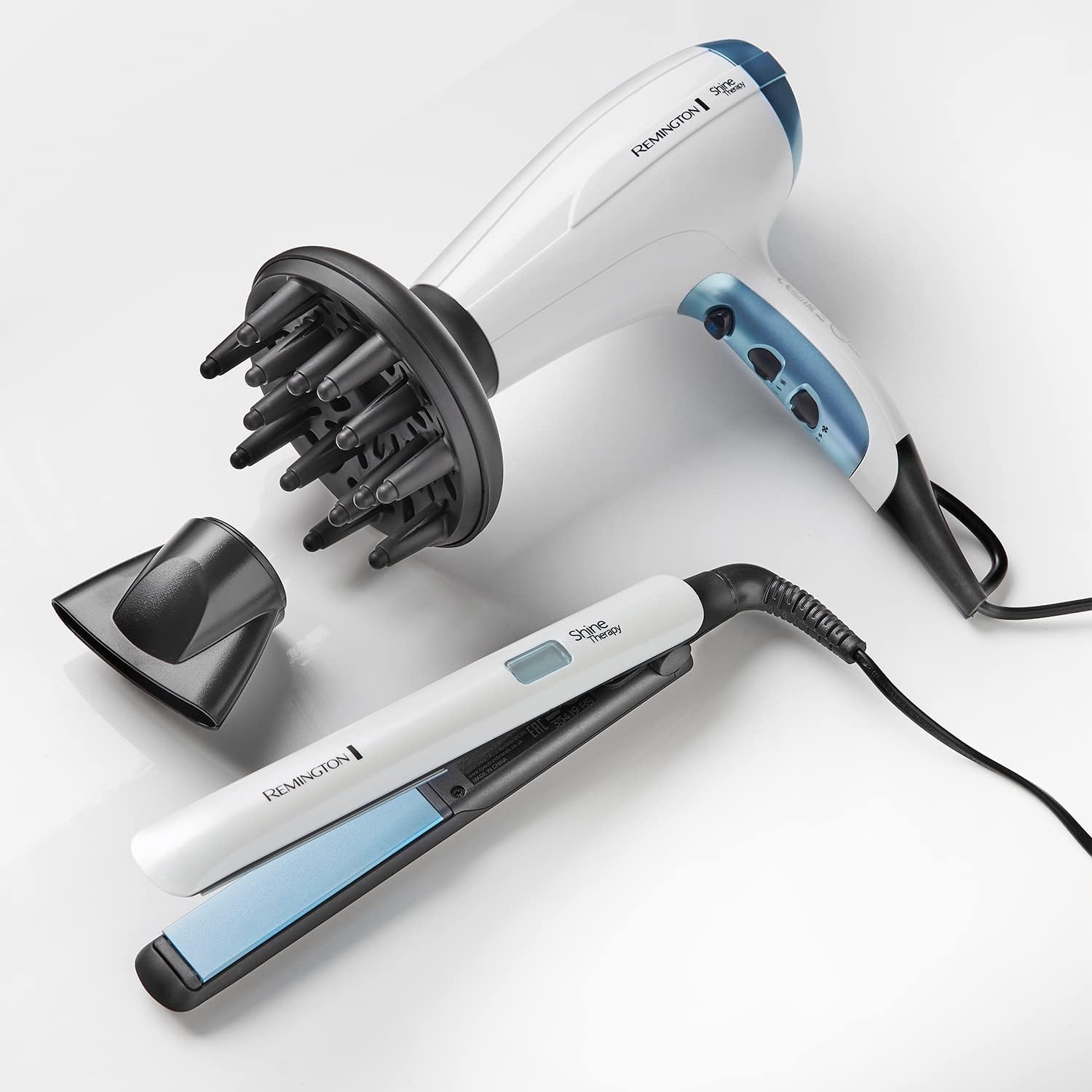 Remington - Lisseur Shine Therapy - plaques slim céramique, soin huile argan, écran LCD, 150-230°C - S8500
