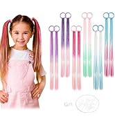 Gamme colorée de ciseaux avec poignées dégradées dans les tons rose, violet et bleu disposés selon un motif d'affichage.