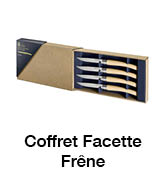 Petite boîte en bois contenant plusieurs outils métalliques fins, probablement pour un travail minutieux. Le texte en français se lit comme suit : « Coffret Facette