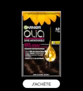 Le texte indique « Garnier », « OLIA ». Emballage du produit pour la coloration des cheveux montrant des gouttelettes d'huile dorées sur fond noir sur plusieurs vues de produits.